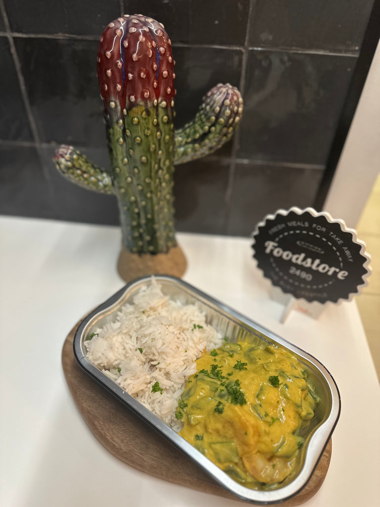 Scampi’s met snijboontjes, curry en rijst